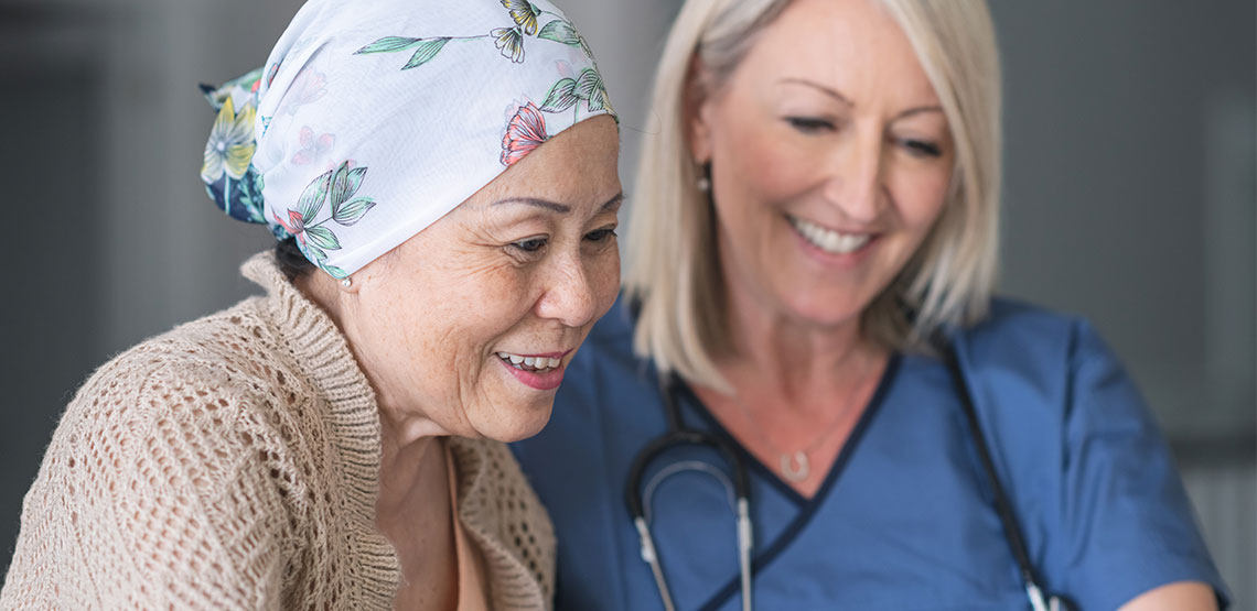 A doctor talking to a cancer patient